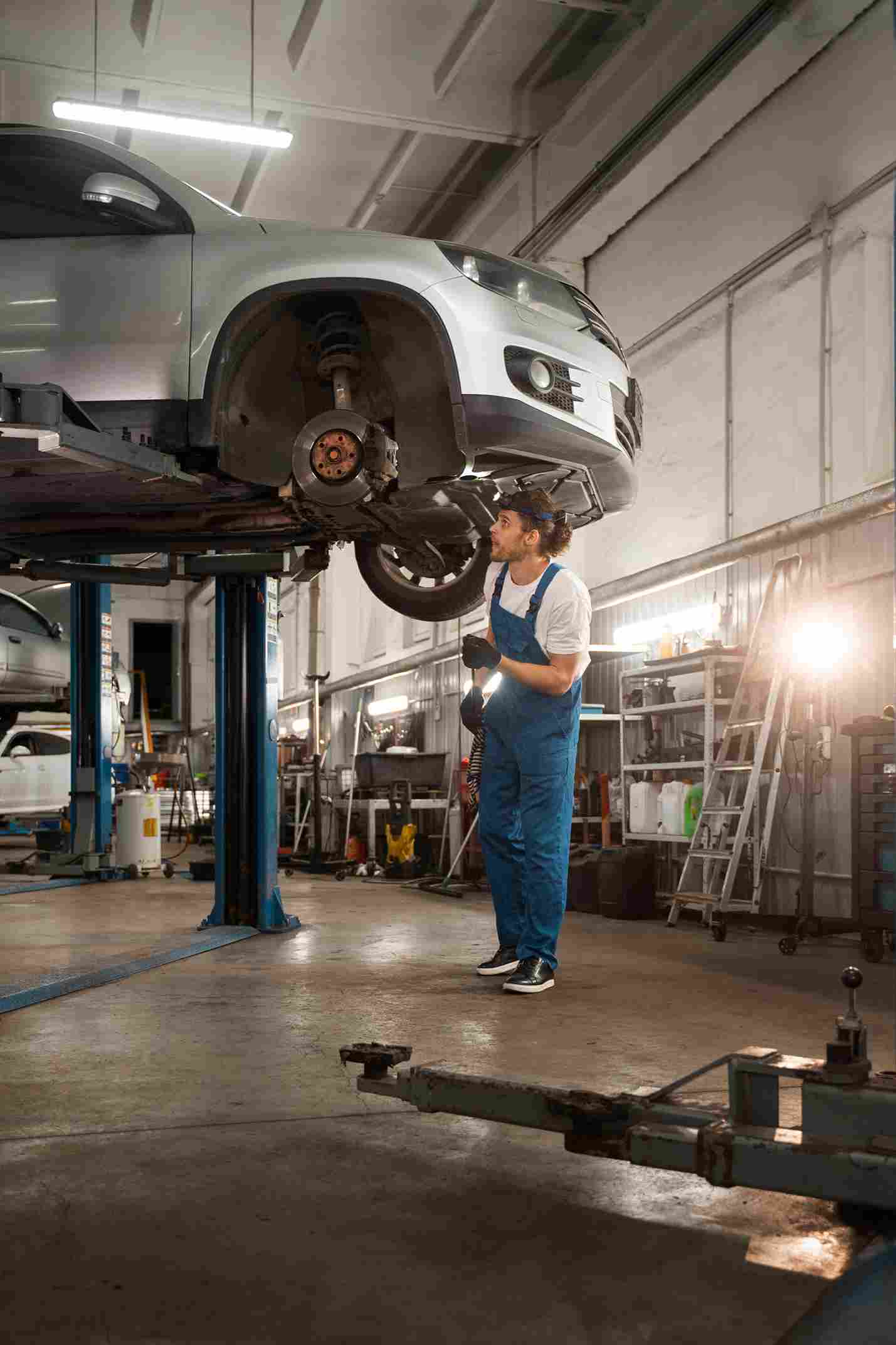 male mechanic working shop car 2_11zon